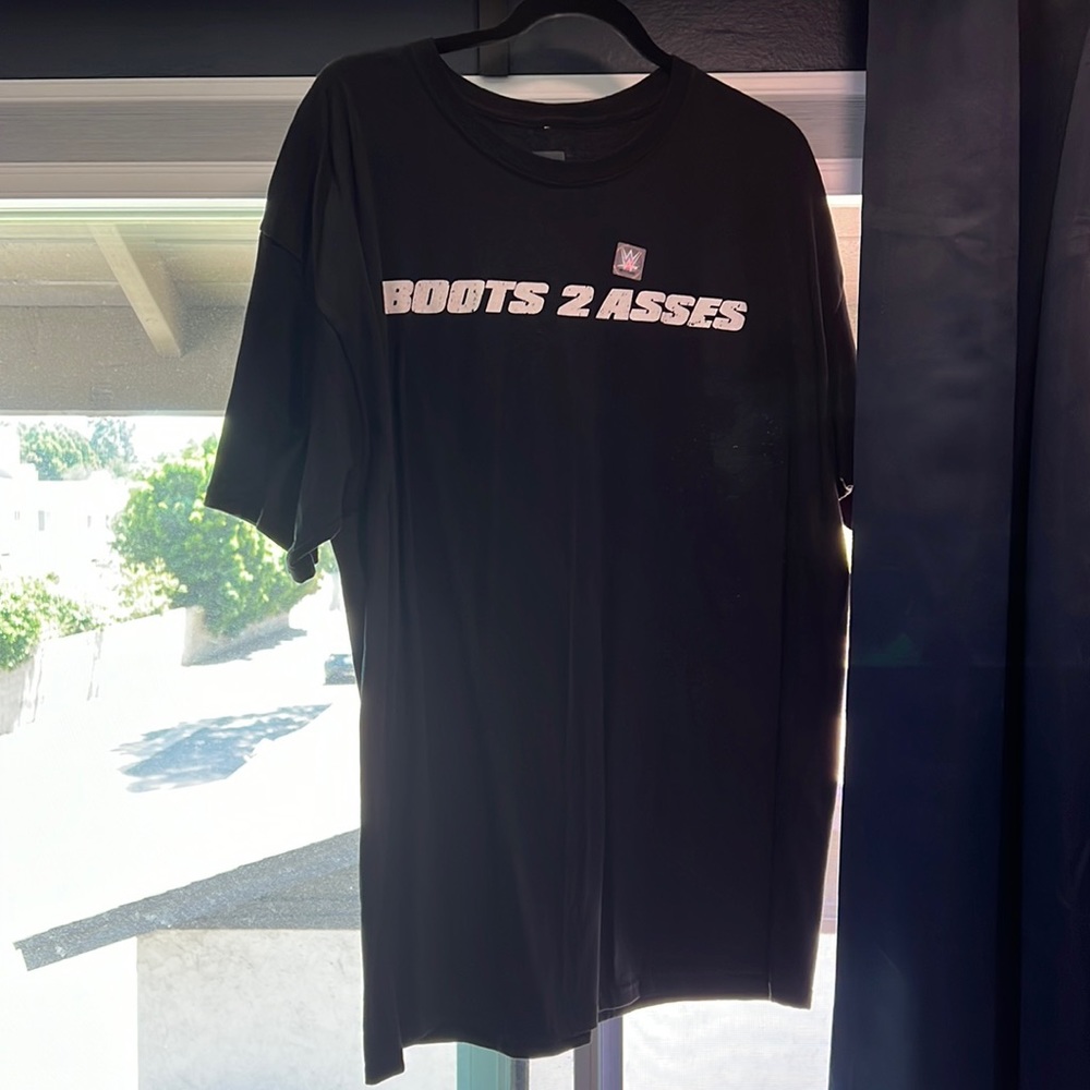 Brand new The Rock “Boots 2 asses” 24/7-365 shirt. Size XL